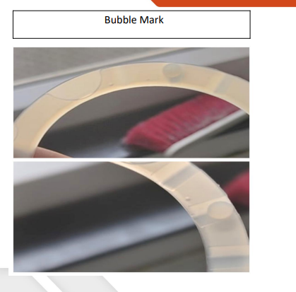 Bubble mark defect visible on plastic gasket surface