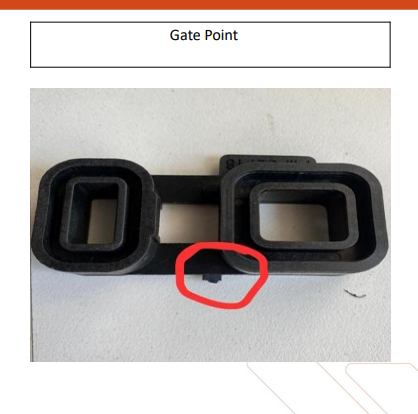 Gate point defect mark on black molded plastic part