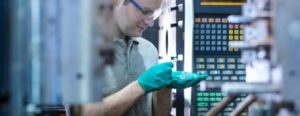 technician performing injection maintenance